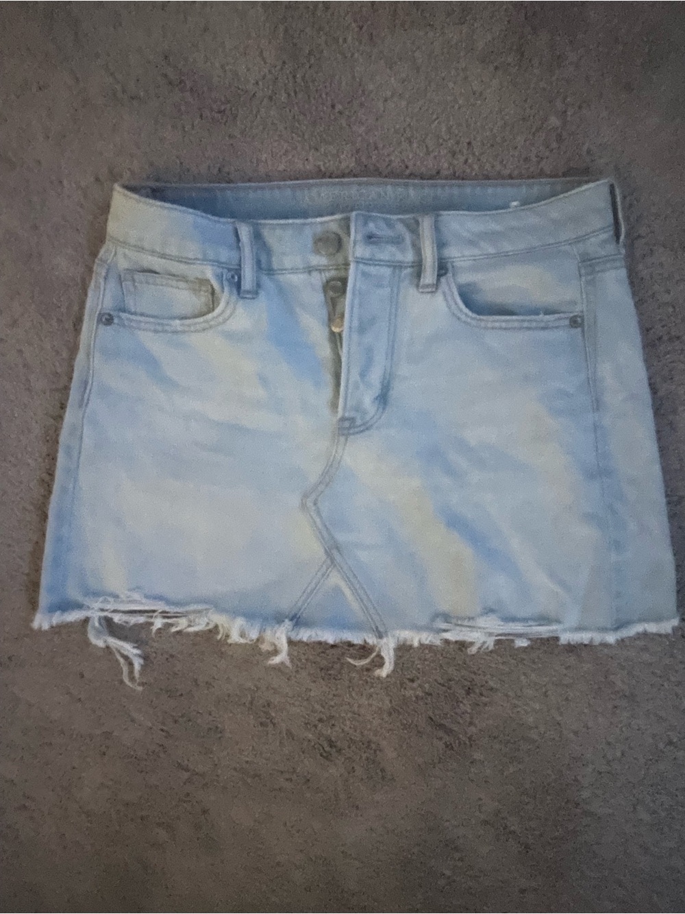 American Eagle Outfitters Light Blue Denim Mini Skirt with Frayed Hem